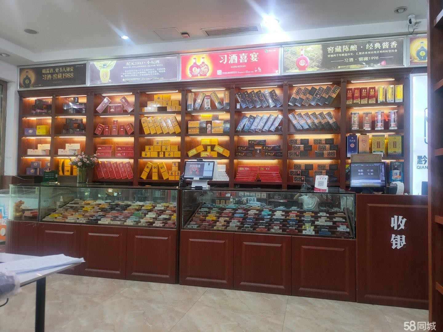 (转让)烟酒超市位于小区正大门，周边酒店，宾馆，饭店，医院，成熟商圈