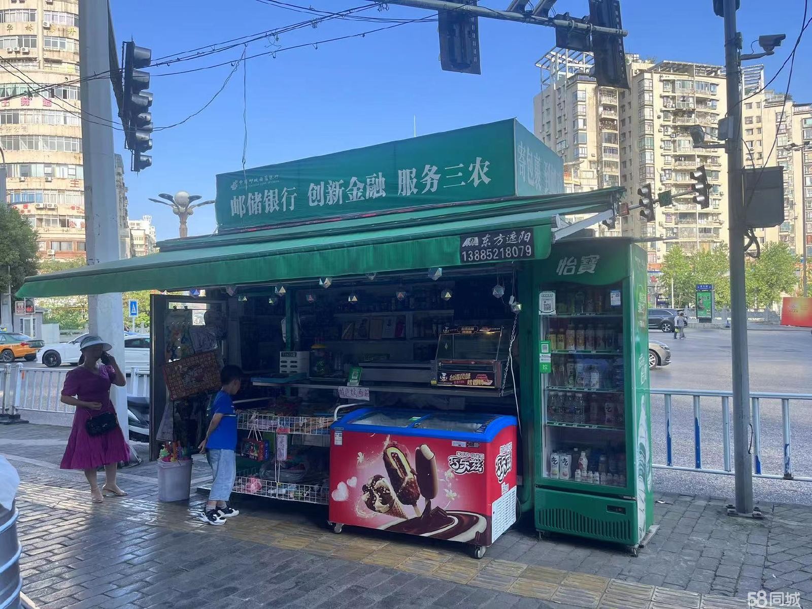 (转让)店铺位于西安路红绿灯十字路口人流量大可经营副食烟酒文具小吃等